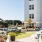 courtyard dining area on turf lawn with ample space 