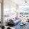 living room showing nearness to bedroom and excellent natural lighting from large windows 