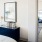 living room showing nearness to bedroom and excellent natural lighting from large windows 