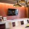 resident coffee bar with a smart TV and seating to lounge or study