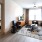 living room showing nearness to bedroom and excellent natural lighting from large windows 