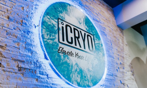 image of iCRYO's sign on a brick wall