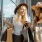 lifestyle image of two women laughing and walking