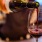 lifestyle image of a man pouring wine into a glass
